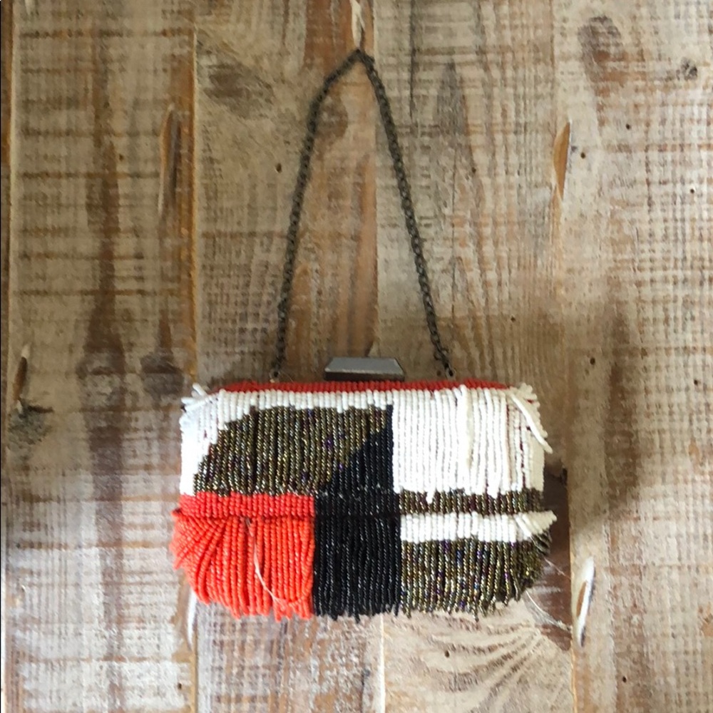 NWT beaded purse. Beaded clutch with optional short chain. Small beaded purse